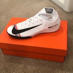 BRAND NEW. Crisp white nike soccer shoes- 2 pairs